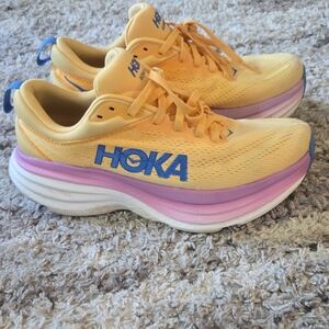 Hoka Vibrant Yellow and Pink Athletic Shoes